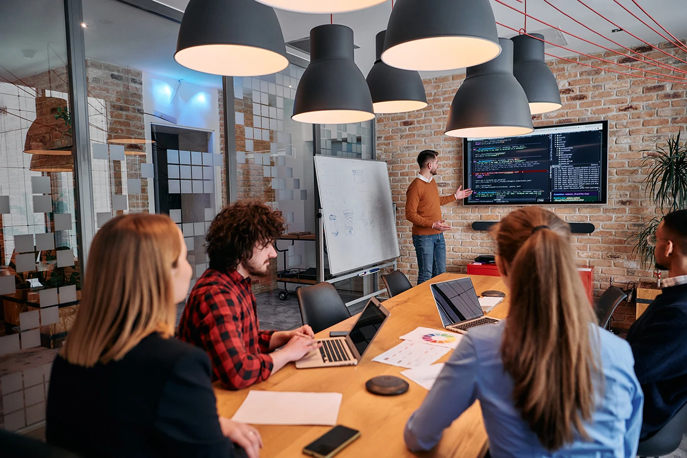 Business team evaluating a fixed-scope software development project